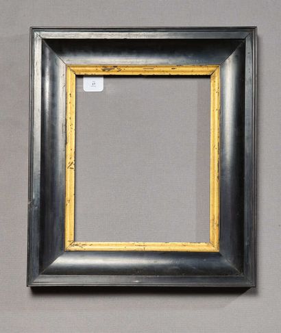 Frame in molded and blackened amaranth, gilded...