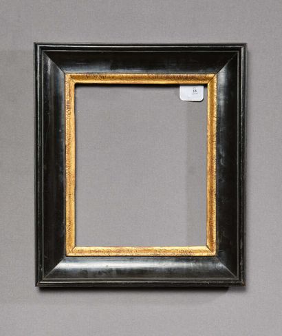 null Frame in blackened and gilded molded wood, water leaves rebate.
Italy.
 18th...