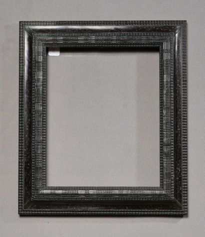 FRAME 
in wood and gilded stucco with reversed...