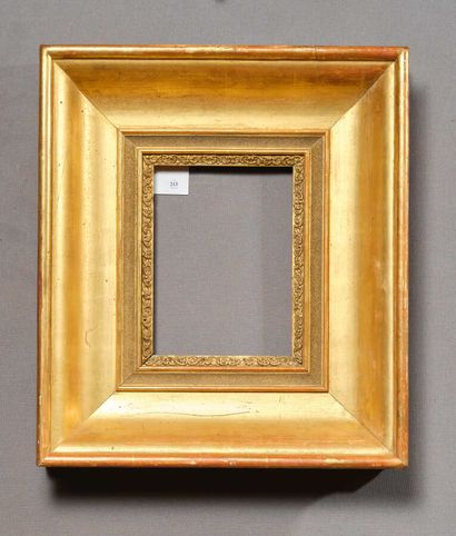 null FRAME 
in wood, gilded paste with hollow profile decorated with frieze of rinceaux...