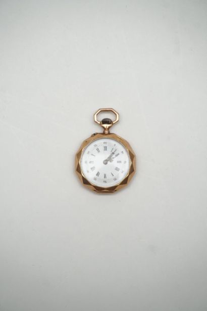 null POCKET WATCH
in 18K yellow gold, white frame, Roman and Arabic numerals. Round...