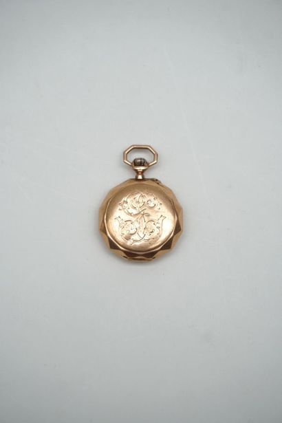 null POCKET WATCH
in 18K yellow gold, white frame, Roman and Arabic numerals. Round...