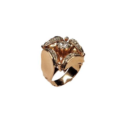 null RING 
in 18K yellow gold set with a central diamond of about 0.25 carat with...