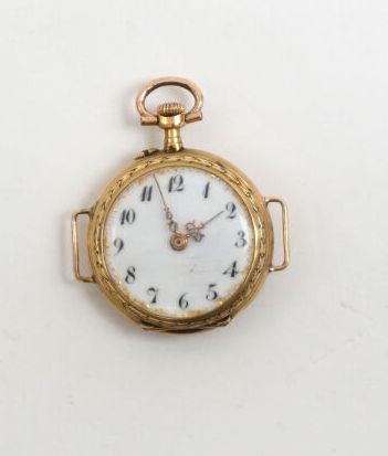 null POCKET WATCH
in 18K yellow gold, white frame, Arabic. Round back engraved with...