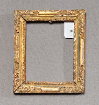 Small FRAME 
in gilded wood carved with foliage...
