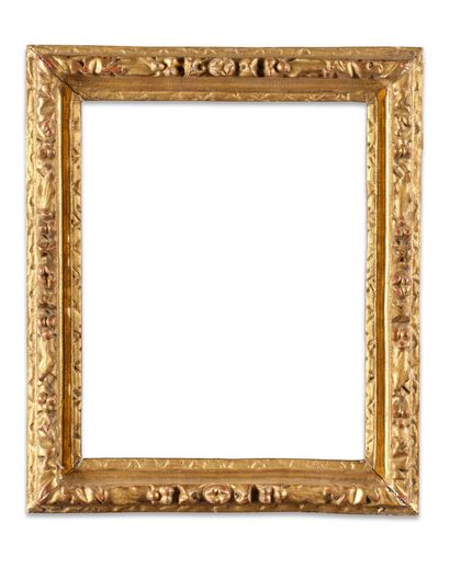 FRAME 
in carved and gilded oak with laurel...