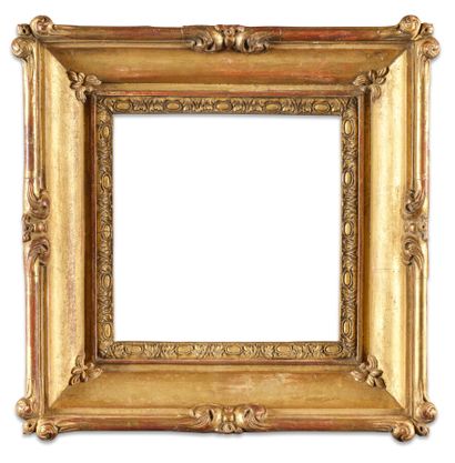 FRAME 
in gilded molded wood with foliated...