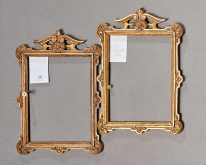 Pair of small FRAMES
 in molded wood, carved...