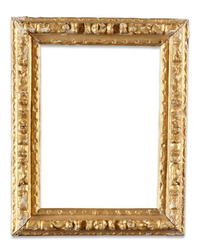 Small FRAME 
in carved and gilded oak with...