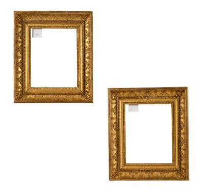 Pair of carved wood and gilded paste FRAMES...