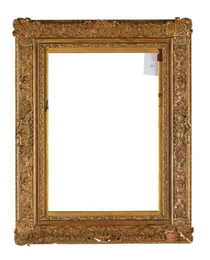 Gilded wood and paste frame with Bérain-style...