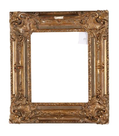 Frame in wood and gilded paste, decorated...