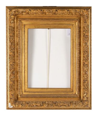 Gilded wood and paste frame decorated with...