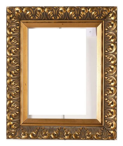 Gilded wood frame decorated with large acanthus...