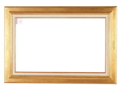 Gilded and molded wood frame decorated with...