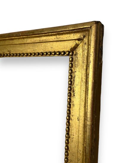 null BAGUETTE - Louis XVI period (63.5 x 48 x 7 cm)
Gilded wood chopstick decorated...