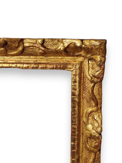 null CADRE - XVIIIe siècle (24 x 19 x 5 cm)
Cadre en chêne sculpté et doré à décor...