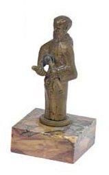 BRIQUET en bronze figurant un moine ithyphallique....
