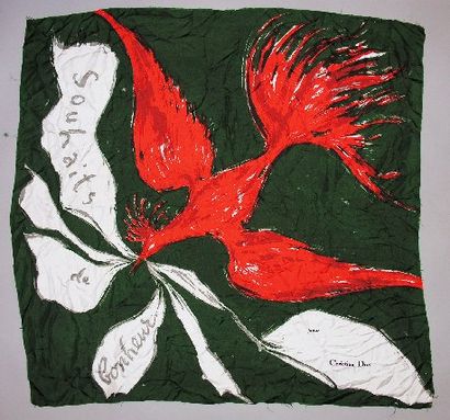 null Un FOULARD en soie, pour CHRISTIAN DIOR, à décor d'un oiseau rouge sur fond...