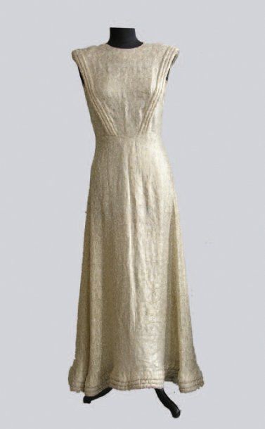 null Une robe en soie brochée or et argent, griffée Jeanne LANVIN, hiver 1948-49...