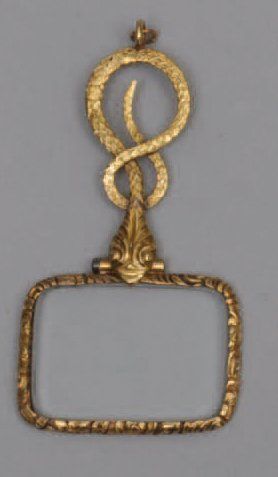 null MONOCLE à main en or jaune orné d'un serpent enroulé. 1819- 1838
