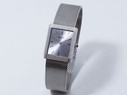 PIAGET Montre bracelet d'homme en or gris 750 millièmes, cadran argenté rayonnant...