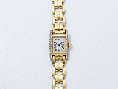 CARTIER ‘'MINI TANK''
Montre bracelet de dame en or 750 millièmes, cadran ivoire...