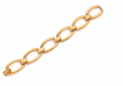 null CARTIER - Bracelet en or (750 ‰) à maillons articulés de forme tonneau. - Signé...
