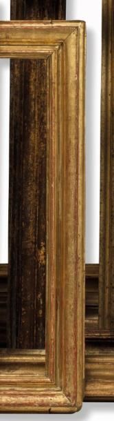 null CADRE dit «Carlo Maratta» en bois mouluré redoré.
Italie, XVIIIème siècle.
41...