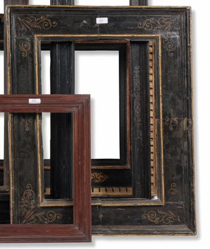 null CADRE en bois mouluré, doré et rechampi noir dit «à cassetta».
Italie, XVIIème...