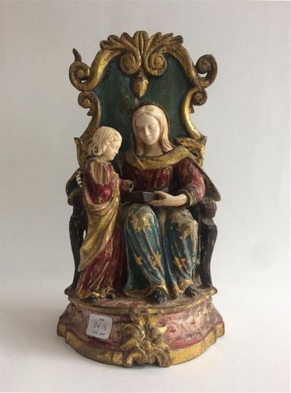 null GROUPE en bois peint et ivoire, La Vierge apprenant à lire à l'Enfant.
 XVIIeme...