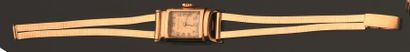 null JUVENIA. Bracelet montre en or jaune 750MM, lunette rectangulaire, fond or,...
