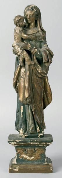 FRANCE, XVIIe siècle VIERGE À L'ENFANT en chêne sculpté, peint et doré sur son socle...
