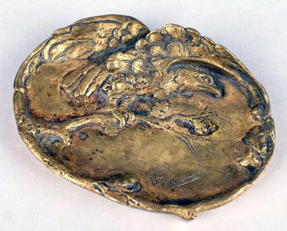 Albert MARIONNET (1852-1910) VIDE-POCHES en bronze à patine médaille orné d'un aigle....