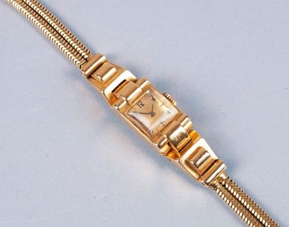 null MONTRE-BRACELET de DAME des années 1940 en or jaune 750/1000, bracelet double...