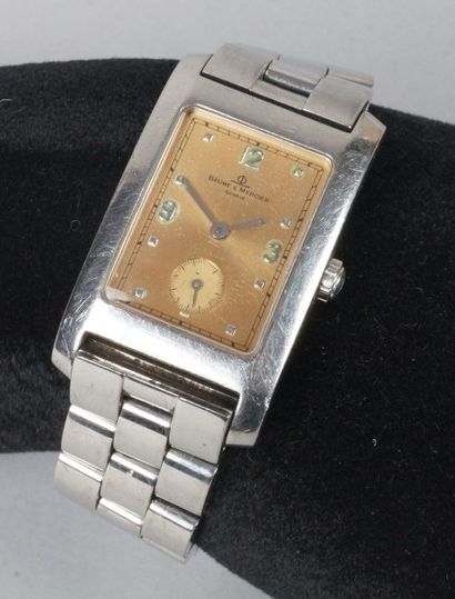 BAUME et MERCIER Genève 
BRACELET-MONTRE D'HOMME en acier modèle «Hampton» avec cadran...