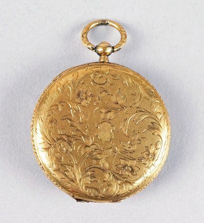 null MONTRE DE GOUSSET en or jaune vers 1830 à décor gravé de rinceaux sur fond amati.
D.:...