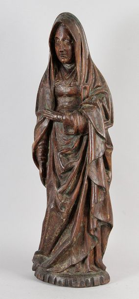 null VIERGE OU SAINTE FEMME en chêne sculpté avec traces de polychromie. XVe siècle.
Haut.:...