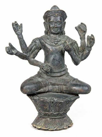 null SUJET en bronze de patine brune représentant Vishnu à six bras, assis en méditation,...