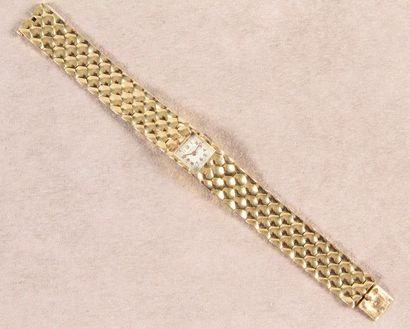 S. VANE MONTRE DE DAME en or, cadran rectangulaire, bracelet articulé en or.
Poids:...