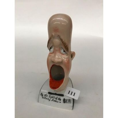 null SMOKING ASHTRAY. Anthropomorphic ashtray representing a caricatured head of...
