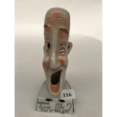 null SMOKING ASHTRAY. Anthropomorphic ashtray representing a caricatured head of...