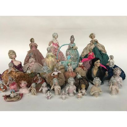 null COLLECTION OF 36 DOLLS AND DOLLS BUSHES in porcelain and biscuit representing...