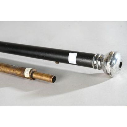 null Blackened Malacca thug's cane. Silver plated bronze puzzle pommel acting as...