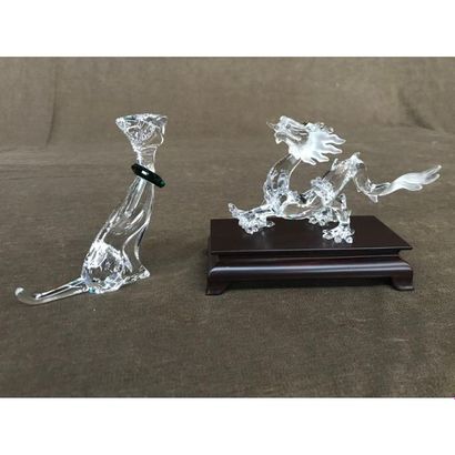 null SWAROVSKI. 2 beautiful subjects representing a dog and a dragon. In their case....