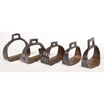 null A SET OF 5 iron SHELVES in the form of arches with geometric or striated motifs....