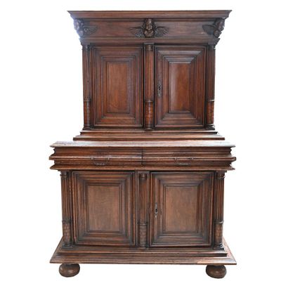 null LOUIS XIII BUFFET in walnut with carved love motifs. It opens with 4 doors framing...