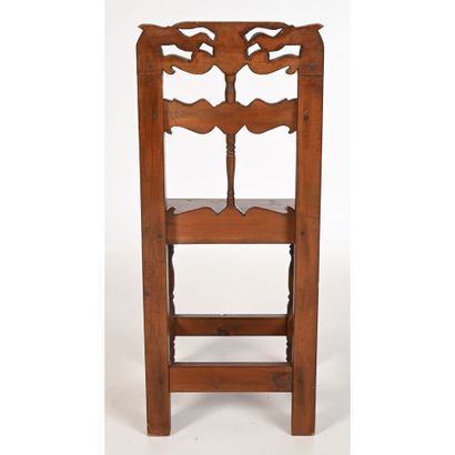 null QUERAS CHAIR in natural wood with a nicely carved back decorated with birds...