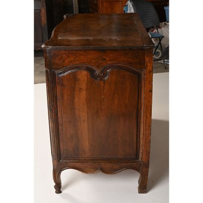 null REGIONAL WALNUT COMMODE with slightly curved front opening with 3 drawers in...