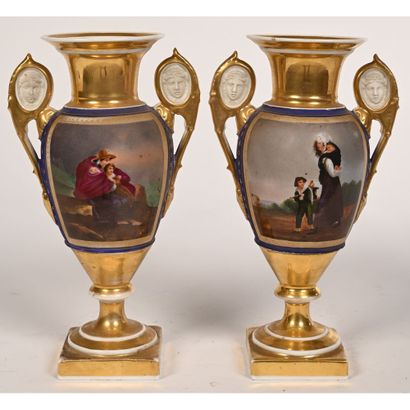 null PAIR OF RESTAURATION porcelain vases decorated with romantic scenes and figures...